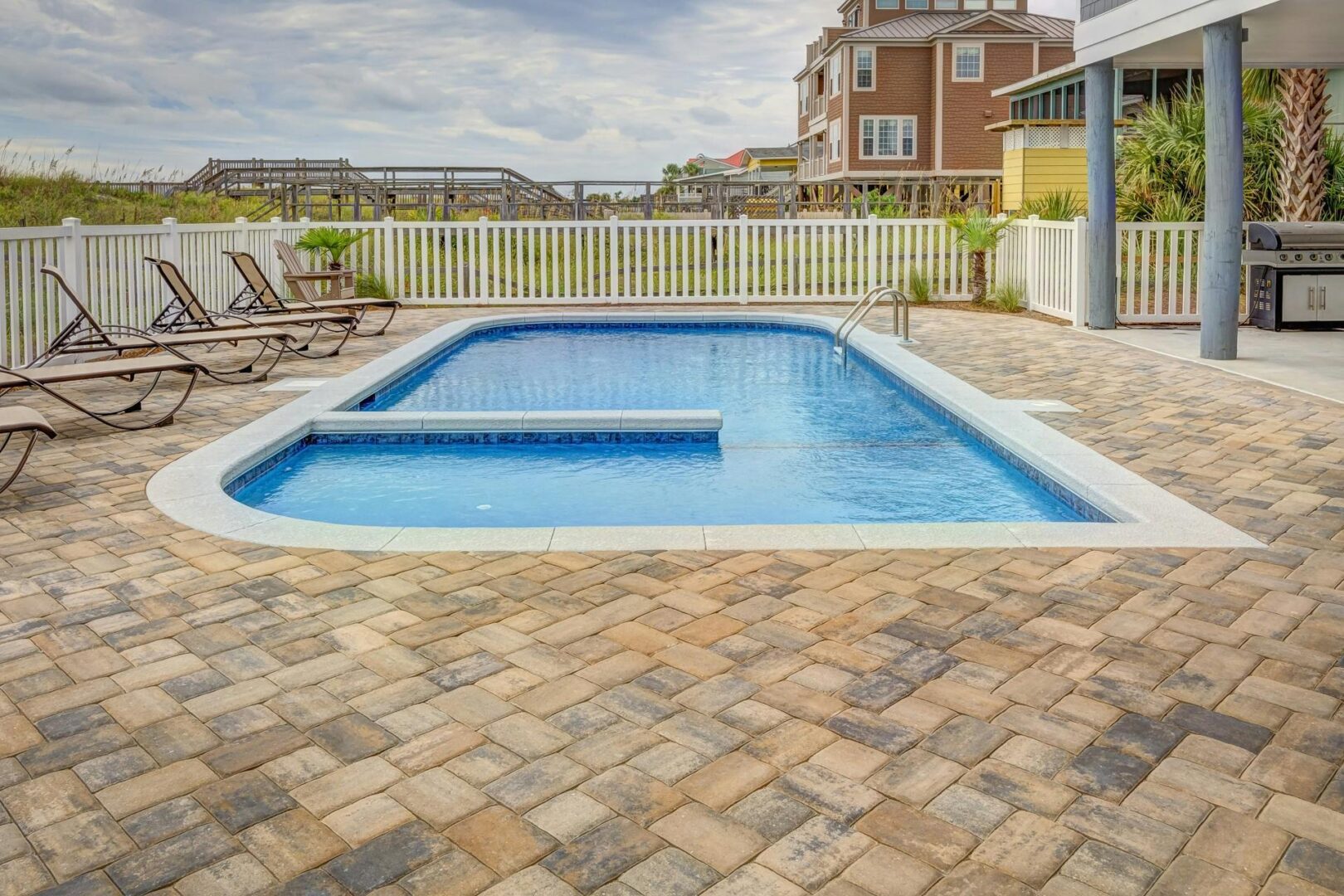 Sparkling clean residential pool maintained by our expert pool cleaners near me.